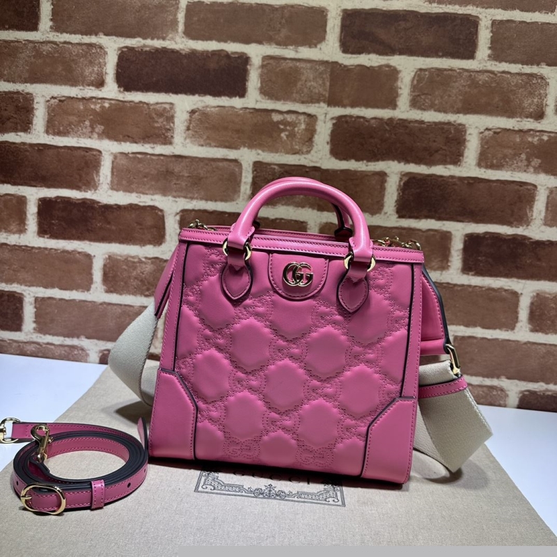 G*u*i top handle bags